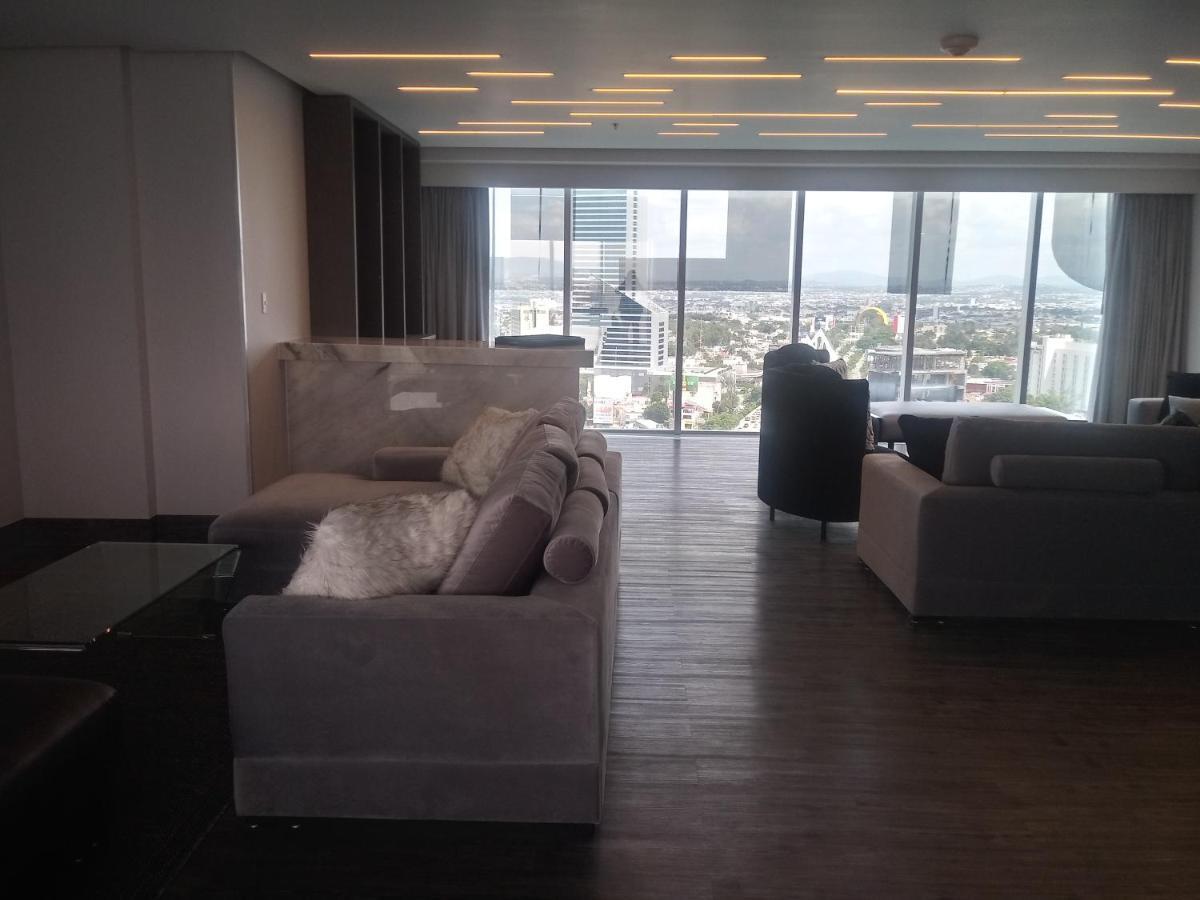 Baruk Guadalajara Hotel De Autor Exterior foto A living room in a penthouse apartment at the Ritz-Carlton, DIFC